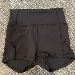Lululemon short black tights Size 4